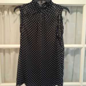 Polka dotted sleeveless blouse